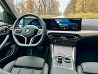 The interior of the BMW i4 eDrive40 is clean, high-tech and driver-focused